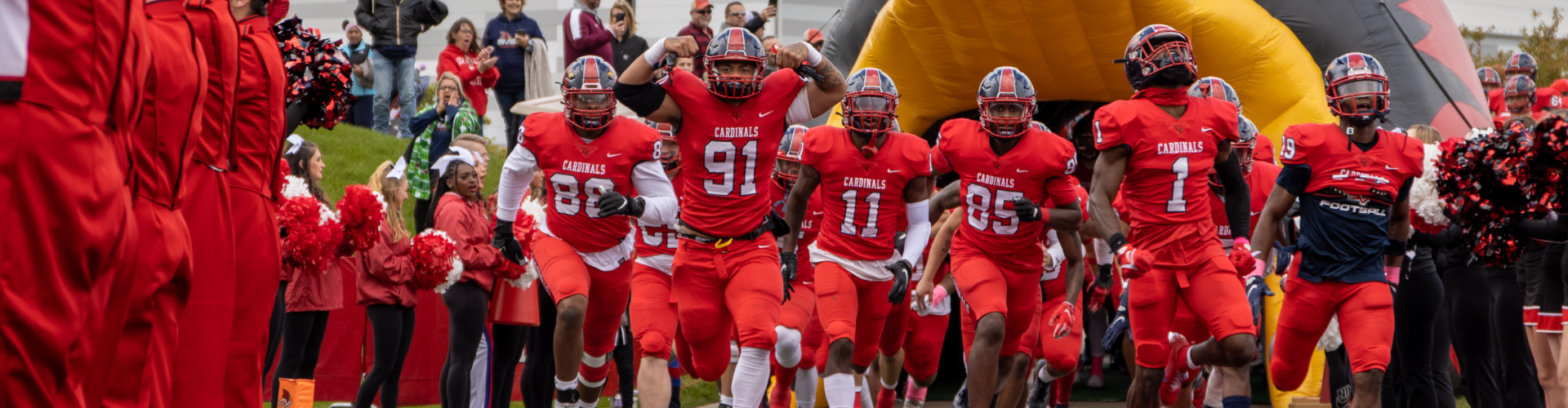 SVSU Football team entering the field at the 2021 Homecoming football game.